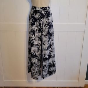 High waisted flowy wide legged pants with slits.  Size S